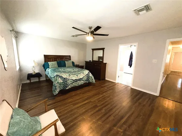 a living room with couch and a table