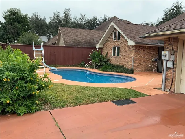 a front view of a house with yard