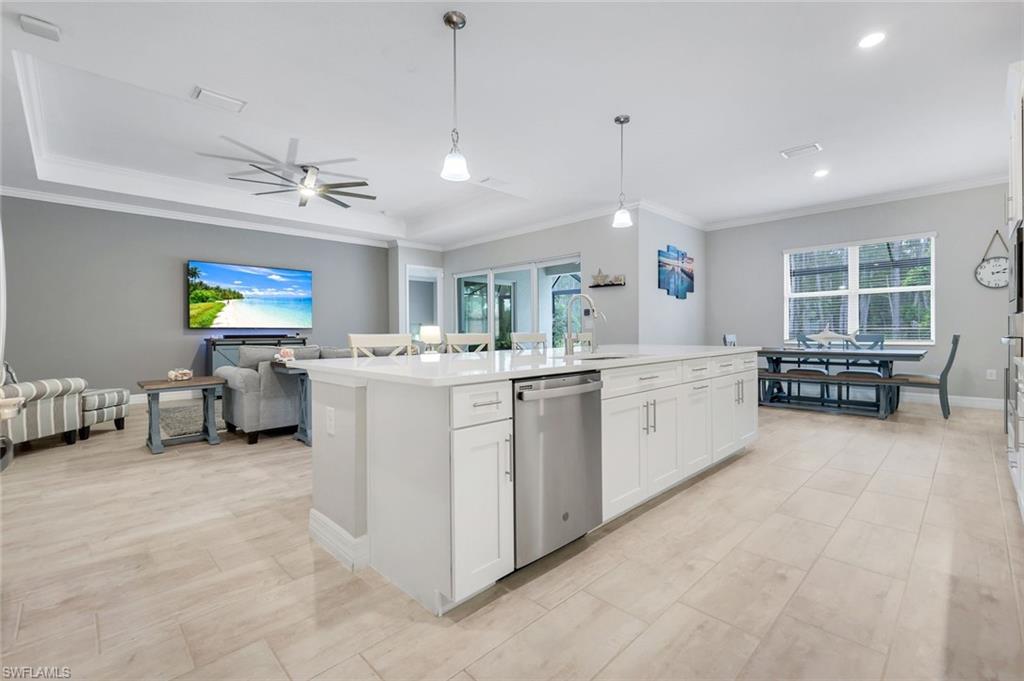 14841 Blue Bay Circle Fort Myers, FL 33913 - Photo 14 of 47 a large white kitchen with a large window