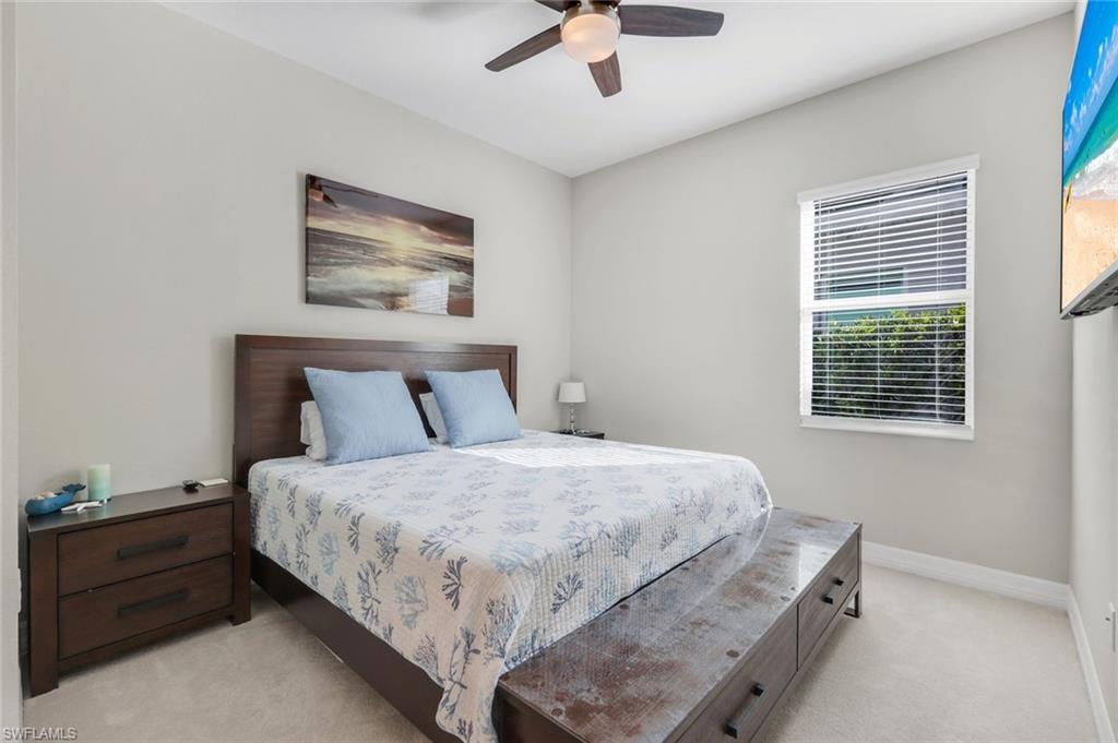 14841 Blue Bay Circle Fort Myers, FL 33913 - Photo 23 of 47 a bedroom with a bed and window