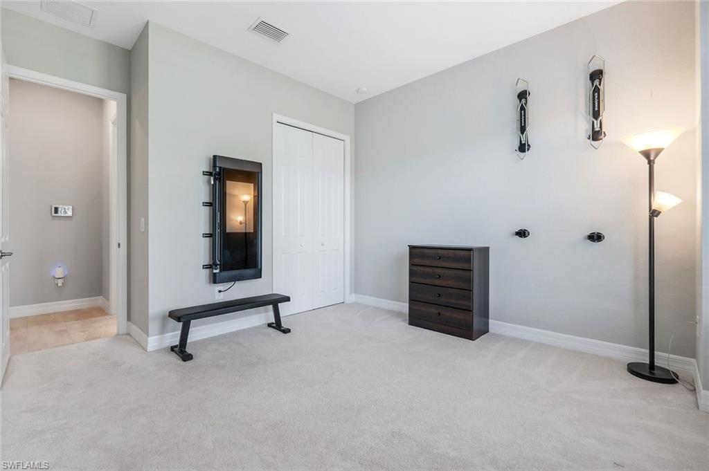 14841 Blue Bay Circle Fort Myers, FL 33913 - Photo 26 of 47 an empty room with a door