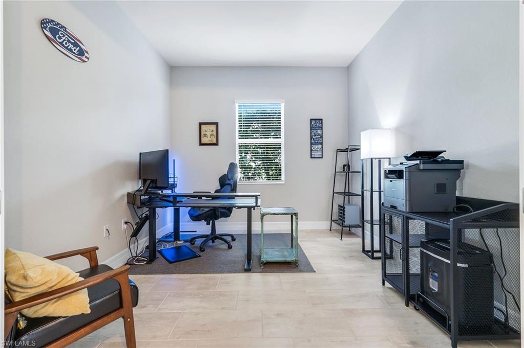 14841 Blue Bay Circle Fort Myers, FL 33913 - Photo 28 of 47 a view of a workspace with furniture and a window