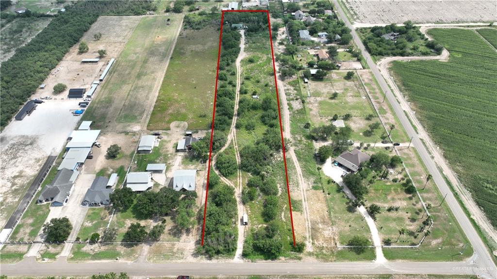 5611 Mile 8 1/2 Road Edinburg, TX 78541 - Photo 2 of 6 an aerial view of residential houses with outdoor space