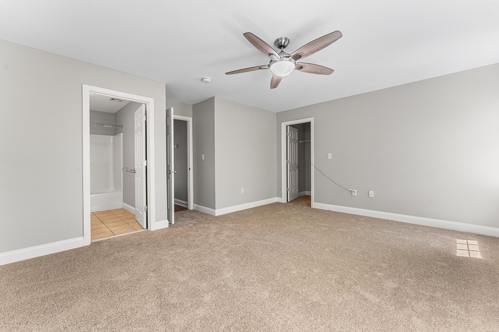60 Dodge Street, Unit 3 Beverly, MA 01915 - Photo 13 of 30 a view of a livingroom with a ceiling fan