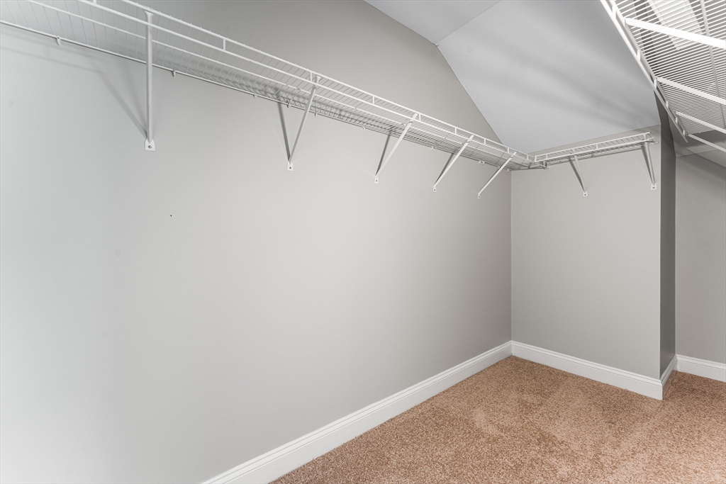 60 Dodge Street, Unit 3 Beverly, MA 01915 - Photo 14 of 30 a view of an empty walk in closet