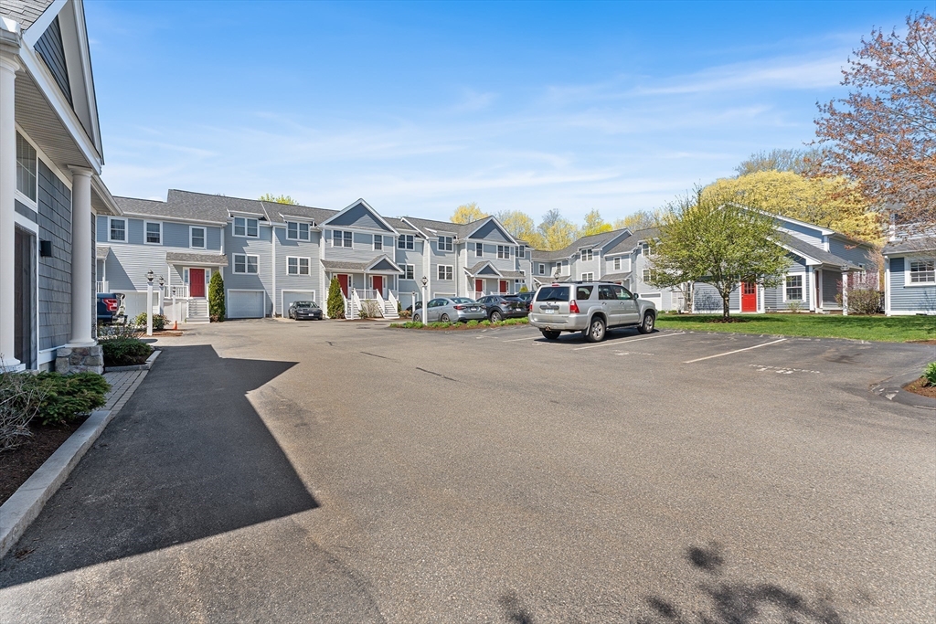 60 Dodge Street, Unit 3 Beverly, MA 01915 - Photo 28 of 30 a city street lined with buildings and trees
