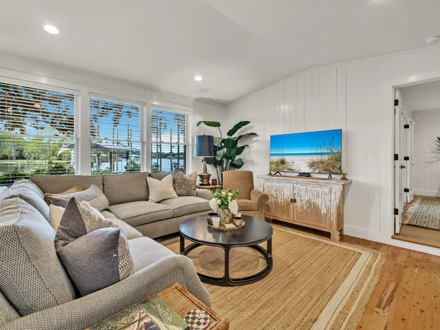 a bathroom with a granite countertop double vanity sink mirror and