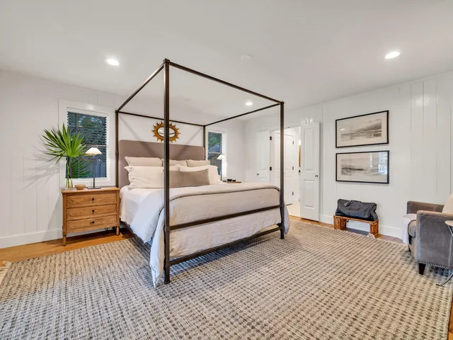 a bathroom with a sink a bathtub and shower