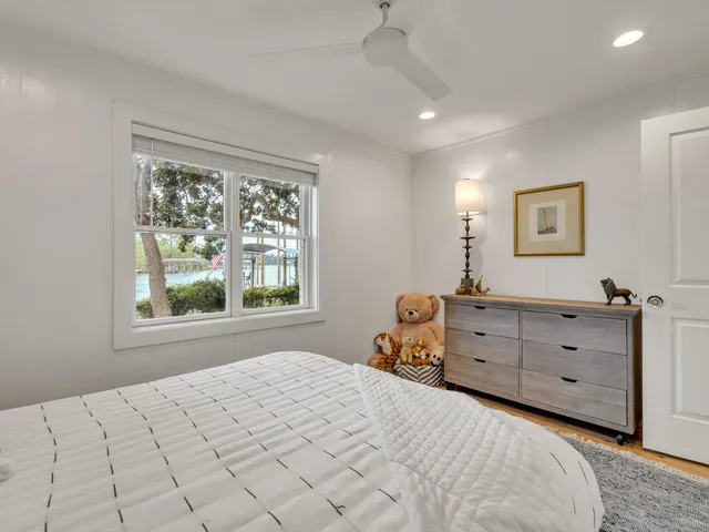 a view of a backyard with sitting area