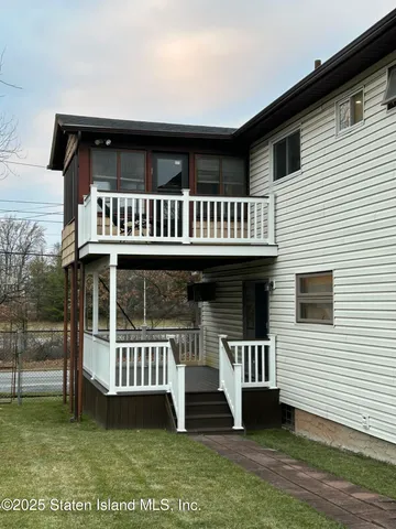 a view of a house with a deck