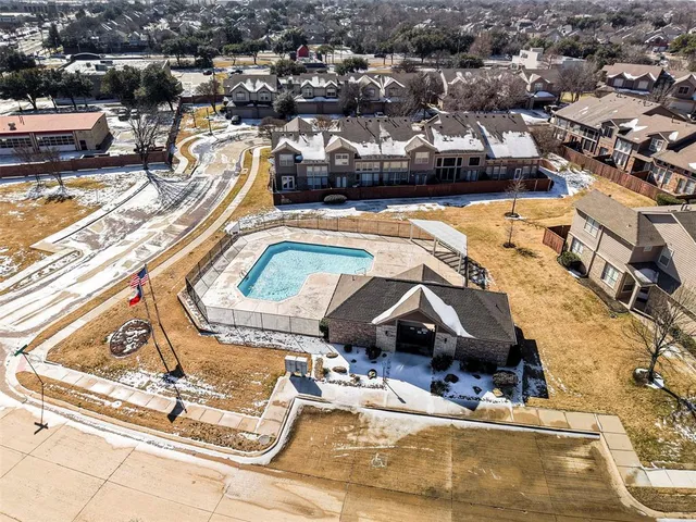 a view of a house with a swimming pool