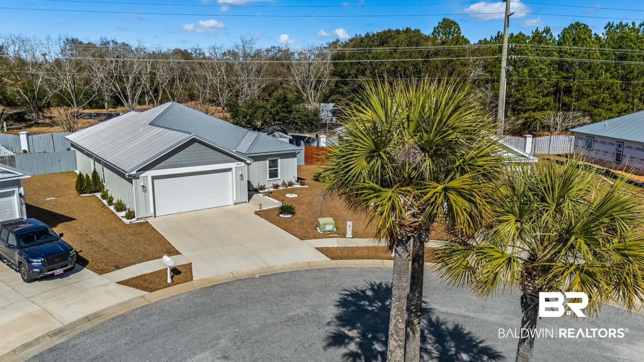 8013 Carmel Circle Foley, AL 36535 - Photo 34 of 49 Aerial view of a tree filled landscape