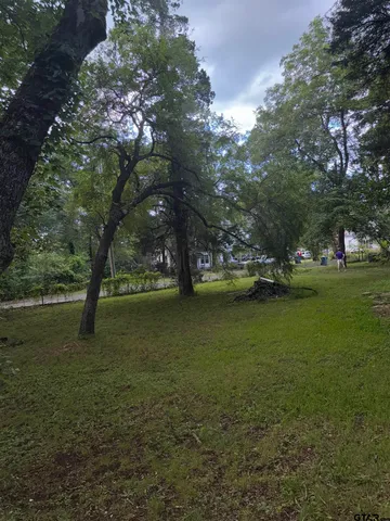 a view of a balcony with chairs