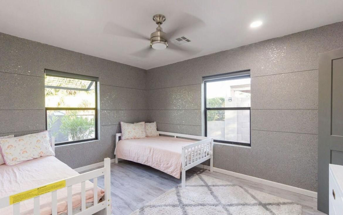 4214 North 20th Street Phoenix, AZ 85016 - Photo 14 of 40 a bedroom with a bed and a window