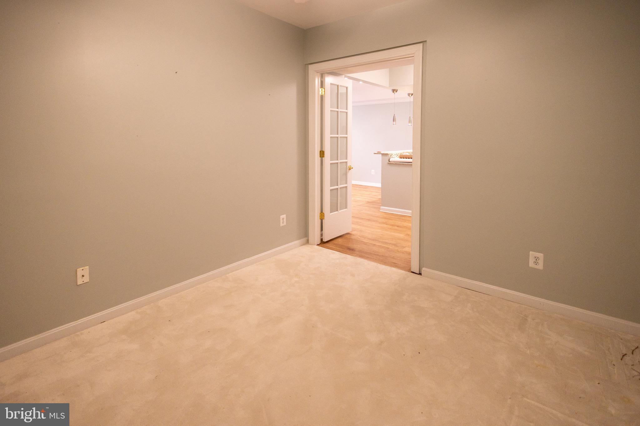8612 Fluttering Leaf Trail, Unit 404 Odenton, MD 21113 - Photo 19 of 27 a view of an empty room