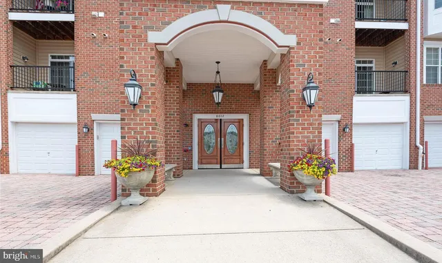 a front view of a house with a porch