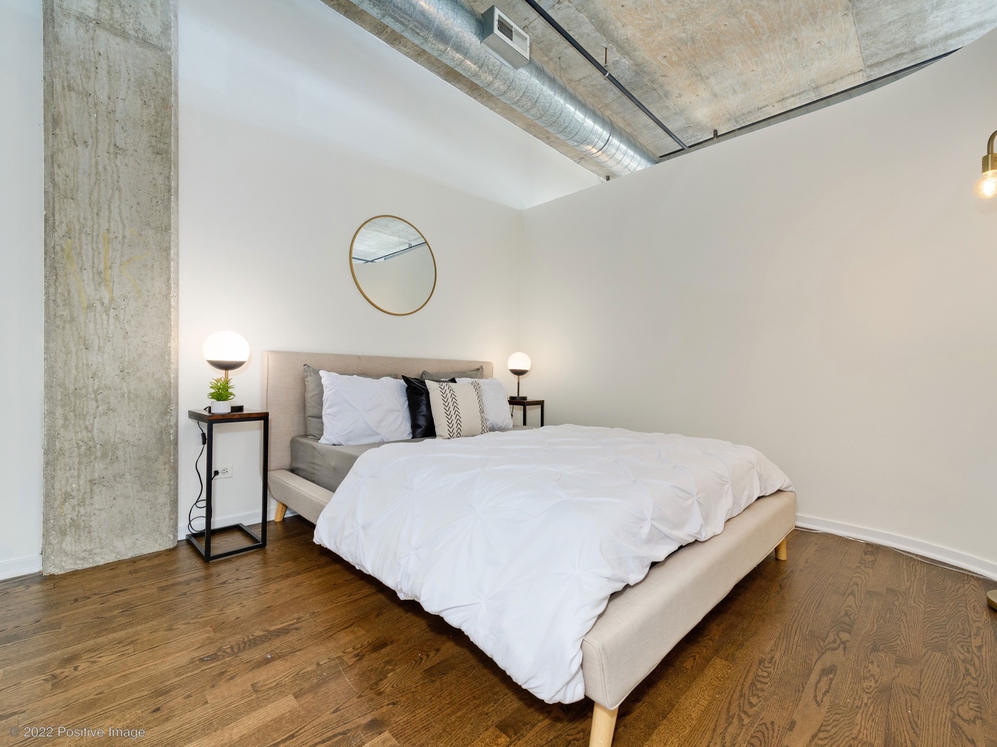 1000 West Adams Street, Unit 613 Chicago, IL 60607 - Photo 16 of 26 a bedroom with a bed and window