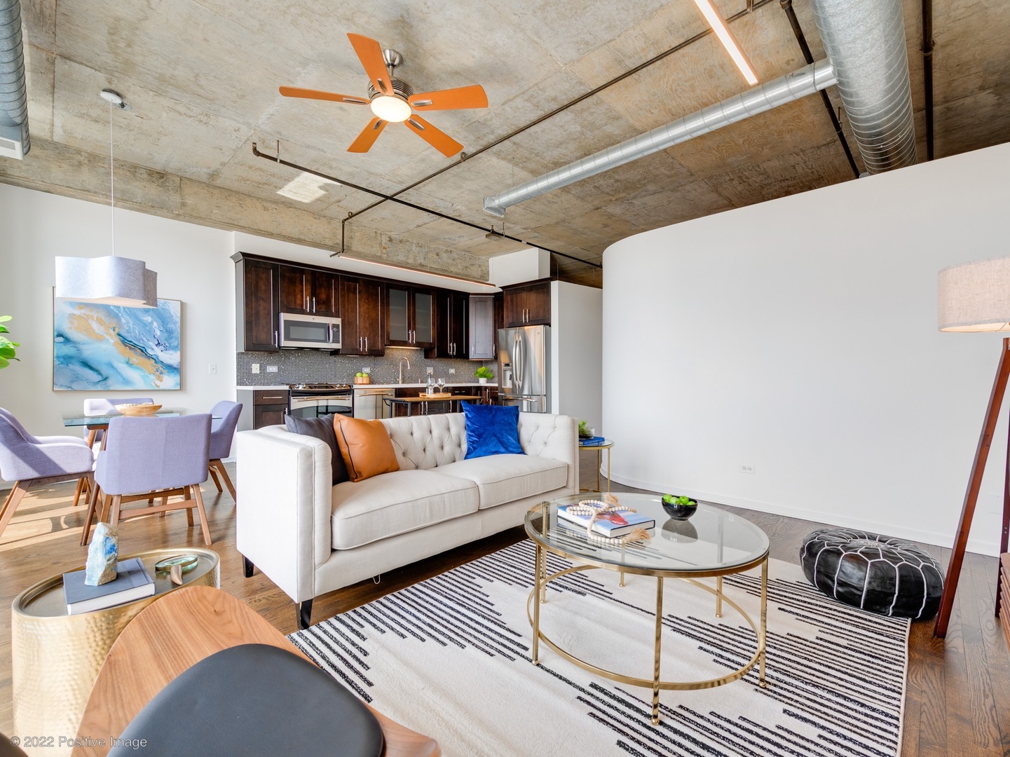 1000 West Adams Street, Unit 613 Chicago, IL 60607 - Photo 3 of 26 a living room with furniture and a view of kitchen