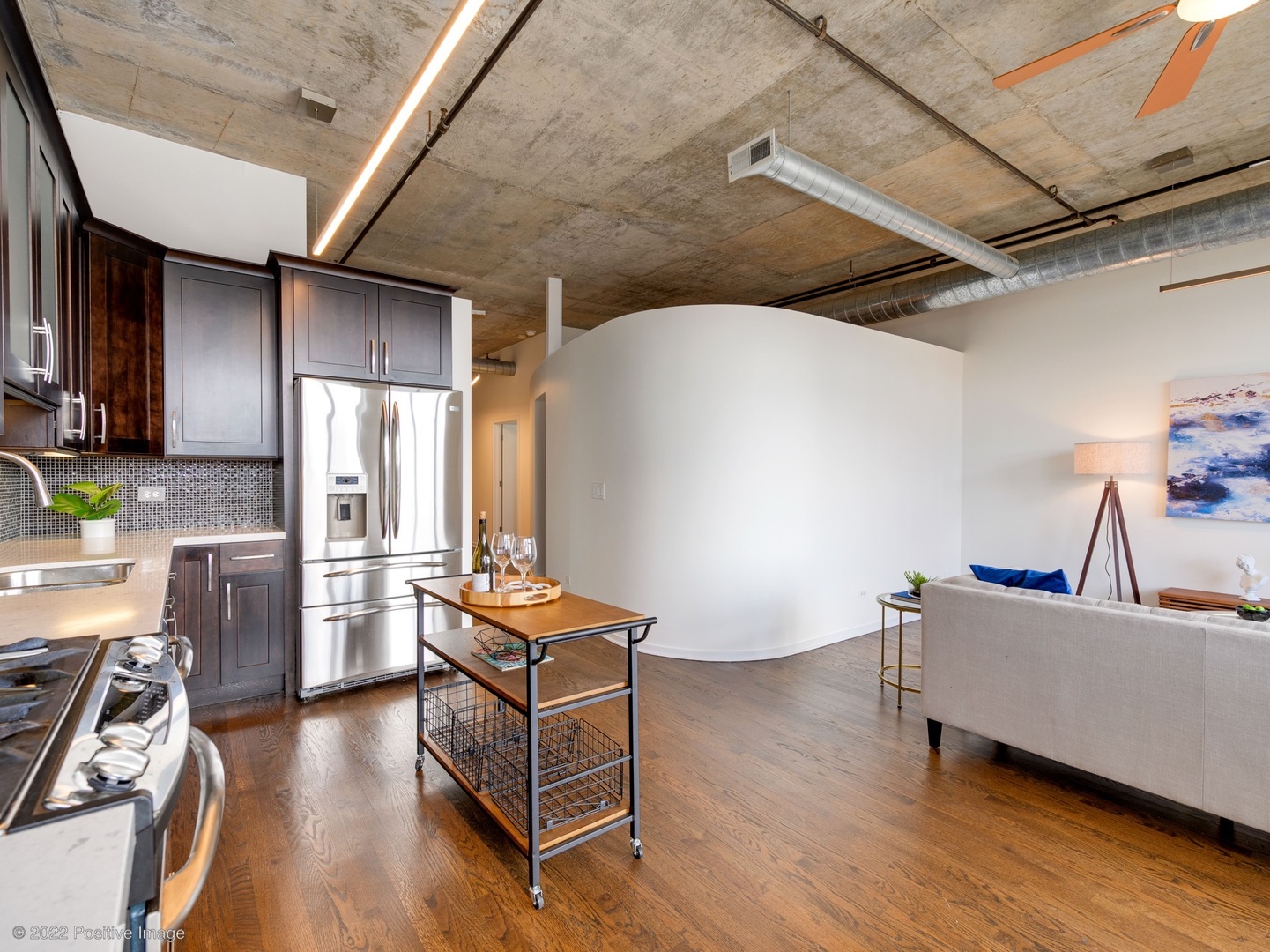 1000 West Adams Street, Unit 613 Chicago, IL 60607 - Photo 6 of 26 a living room with furniture and a table