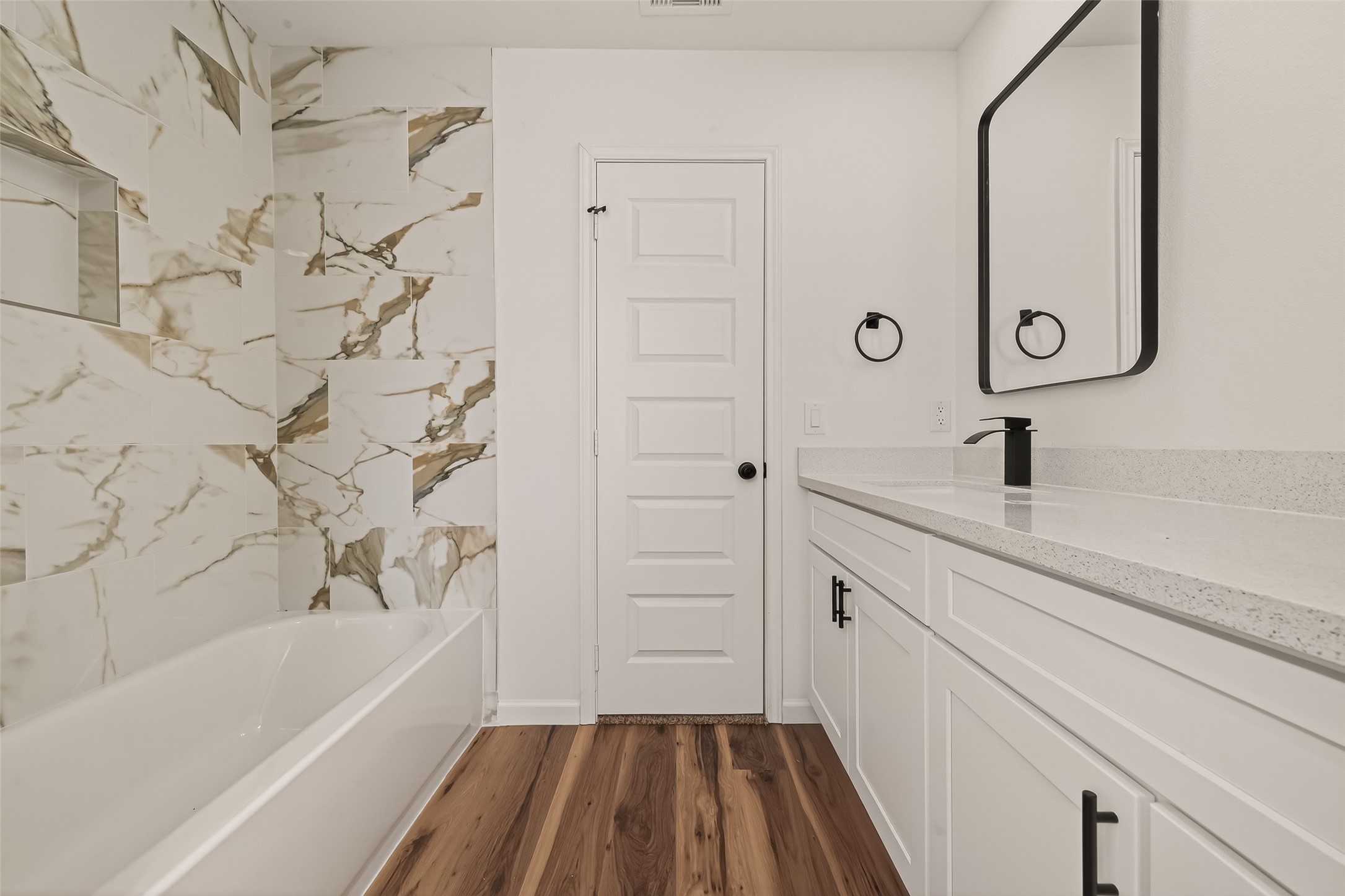2915 Whispering Springs Drive Spring, TX 77373 - Photo 24 of 36 Fully updated bathroom with designer tile surround, soaking tub, and stylish modern accents.