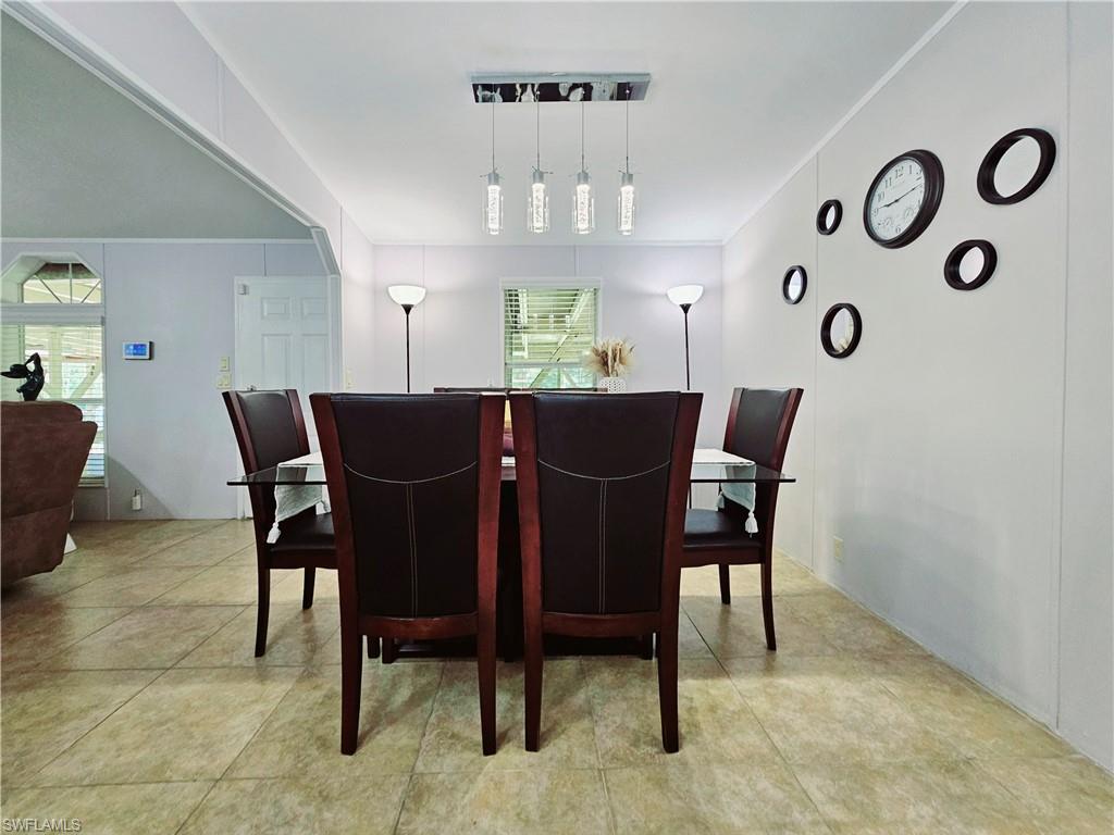330 F Road LaBelle, FL 33935 - Photo 13 of 35 a view of a dining room with furniture