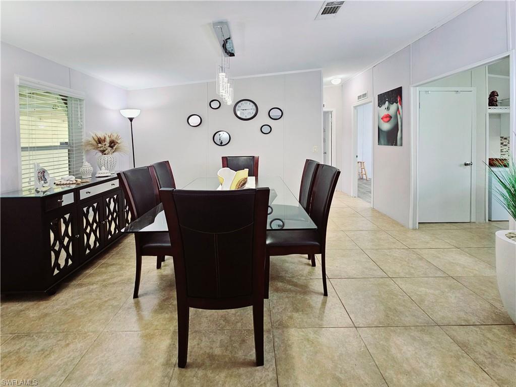 330 F Road LaBelle, FL 33935 - Photo 14 of 35 a dining room with furniture and window