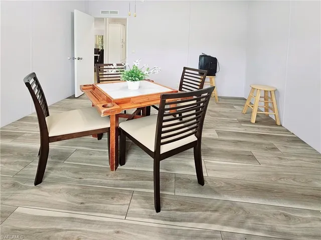 a view of a workspace with furniture