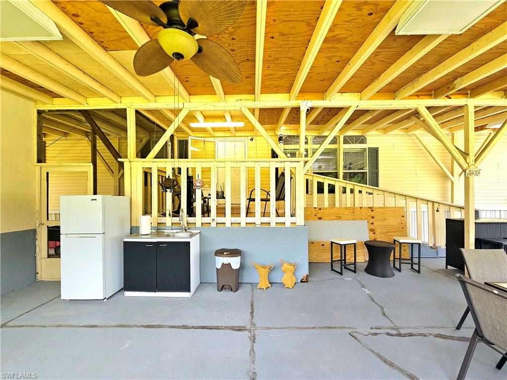 330 F Road LaBelle, FL 33935 - Photo 5 of 35 a building outdoor space with patio furniture and windows