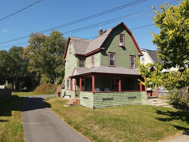 a front view of a house with swimming pool