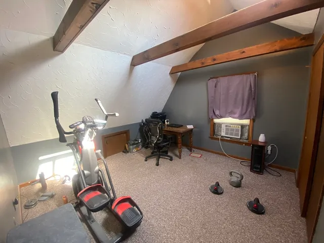 a gym hall with exercise machine