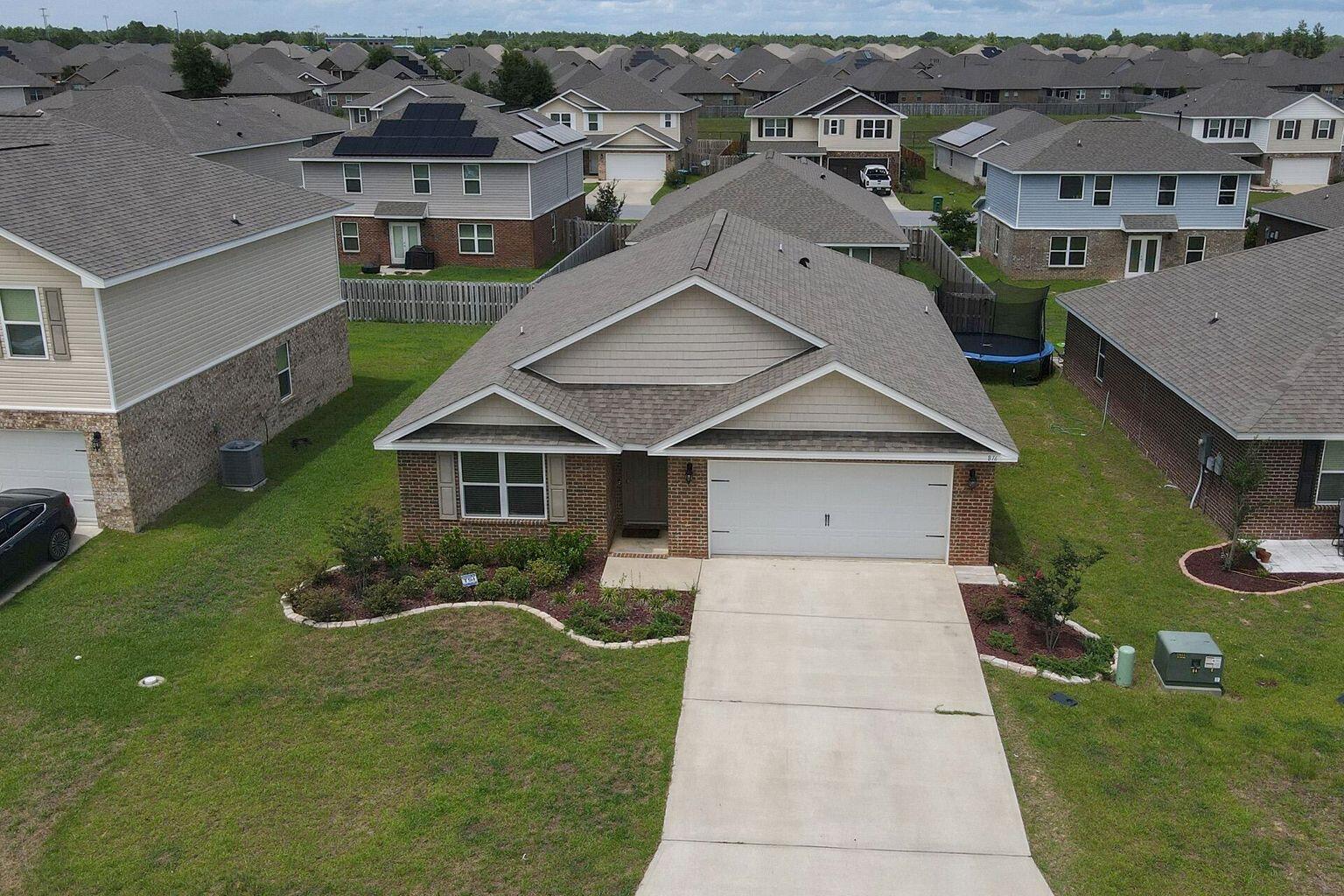 816 Moorhen Way Crestview, FL 32539 - Photo 3 of 19 an aerial view of a house with garden