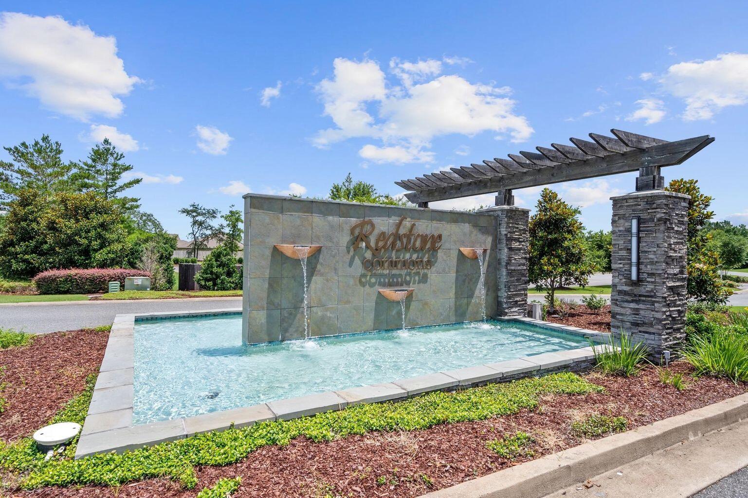 816 Moorhen Way Crestview, FL 32539 - Photo 4 of 19 a view of a house with a yard and potted plants