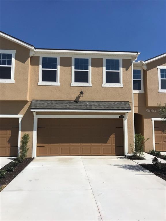 10208 Newel Valley Loop Riverview, FL 33569 - Photo 1 of 1 a front view of a house