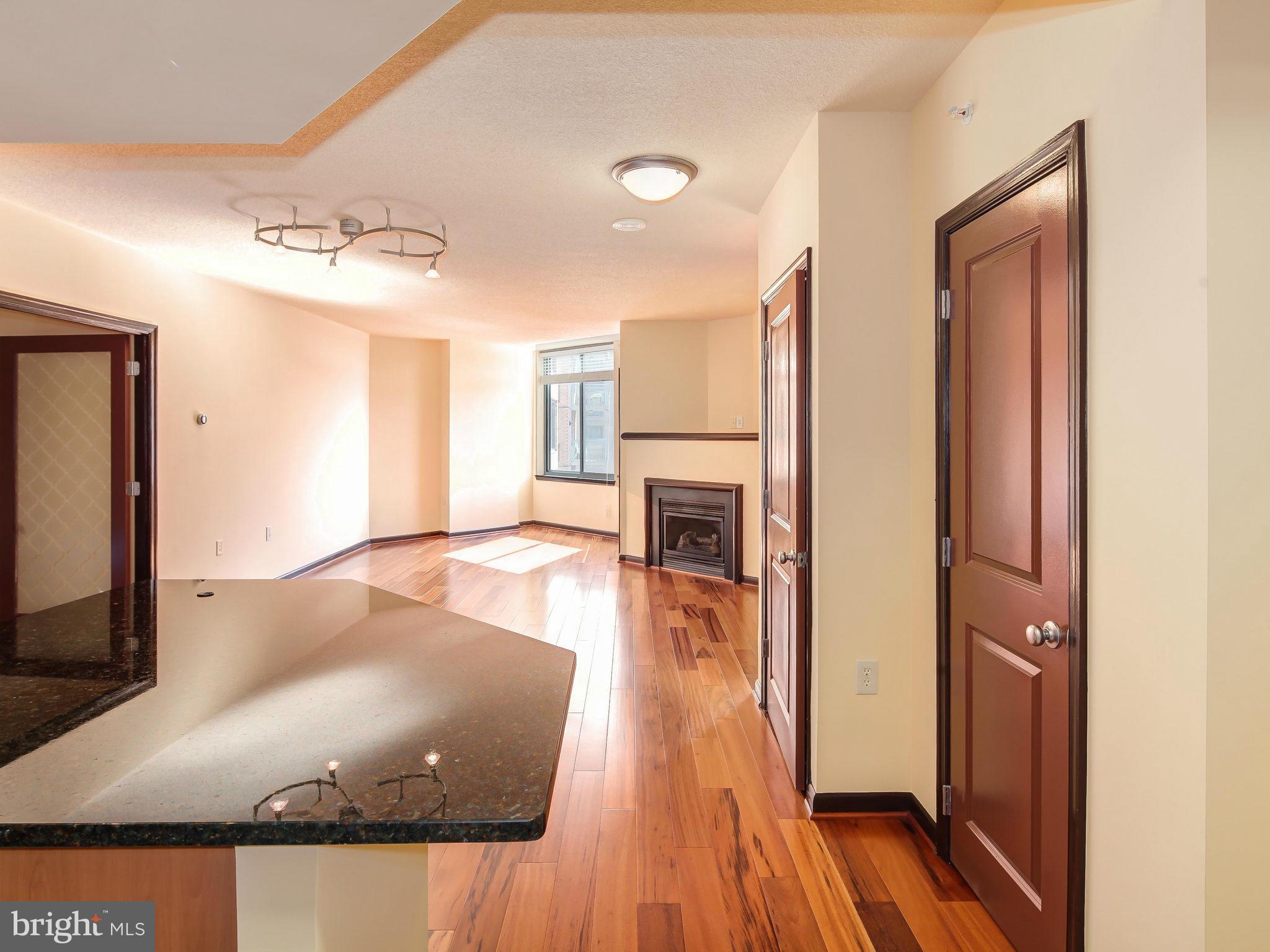 851 North Glebe Road, Unit 921 Arlington, VA 22203 - Photo 2 of 29 a view of a living room with hardwood floor