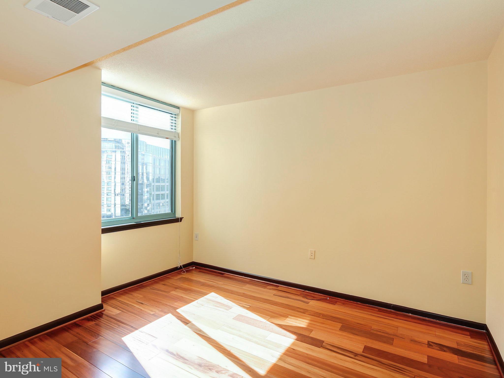 851 North Glebe Road, Unit 921 Arlington, VA 22203 - Photo 16 of 29 a view of an empty room and window