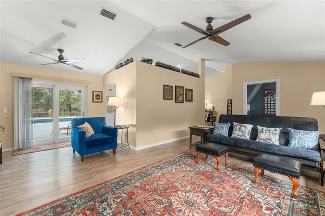 a kitchen with a sink and refrigerator