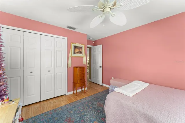 a view of swimming pool with sitting area
