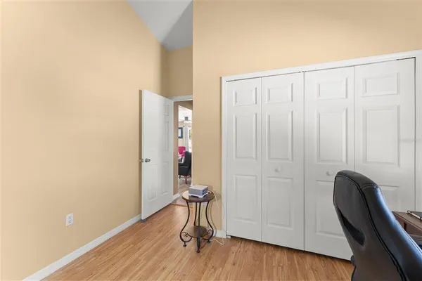 a media room with lots of chairs and a projector