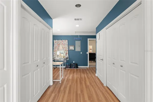 a view of a storage area with racks on the wall