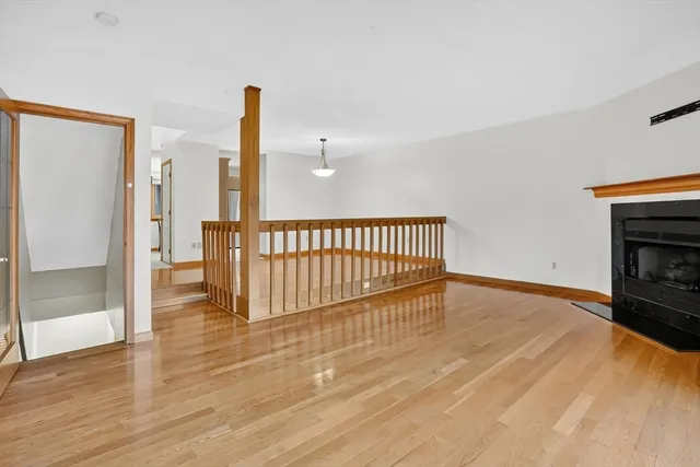 a kitchen with stainless steel appliances granite countertop a stove microwave and sink
