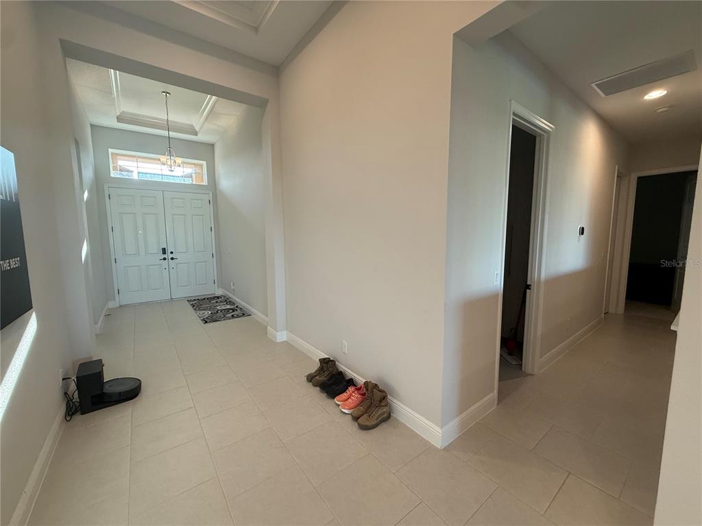 10958 Rustic Timber Loop San Antonio, FL 33576 - Photo 18 of 48 an empty room with windows