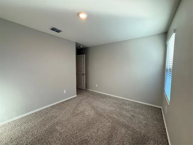 an empty room with an entryway