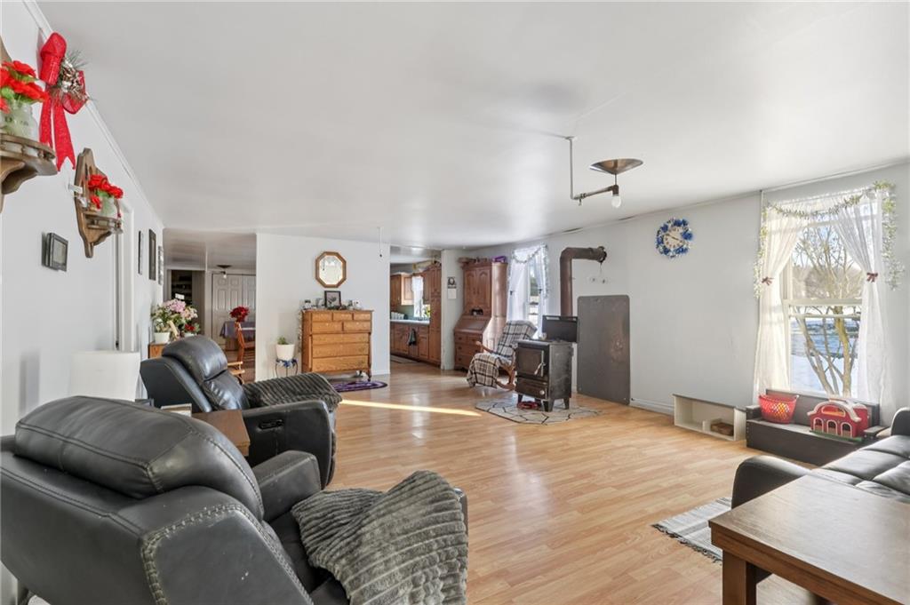 2753 Hemlock Lake Road Rossiter, PA 15772 - Photo 15 of 50 a living room with furniture and wooden floor