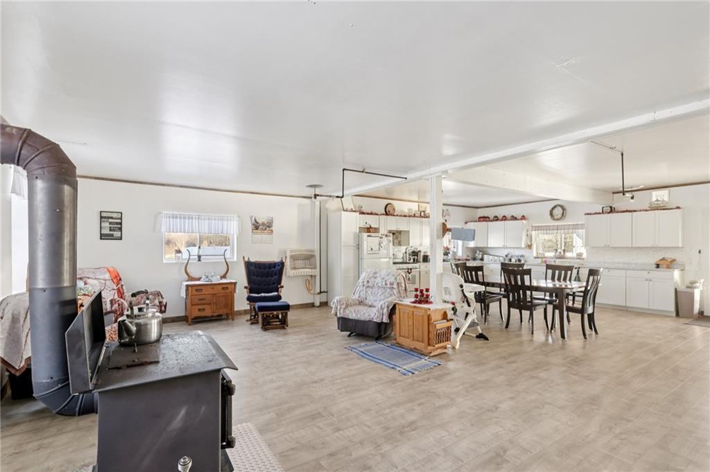 2753 Hemlock Lake Road Rossiter, PA 15772 - Photo 18 of 50 a living room with lots of furniture and gym equipment