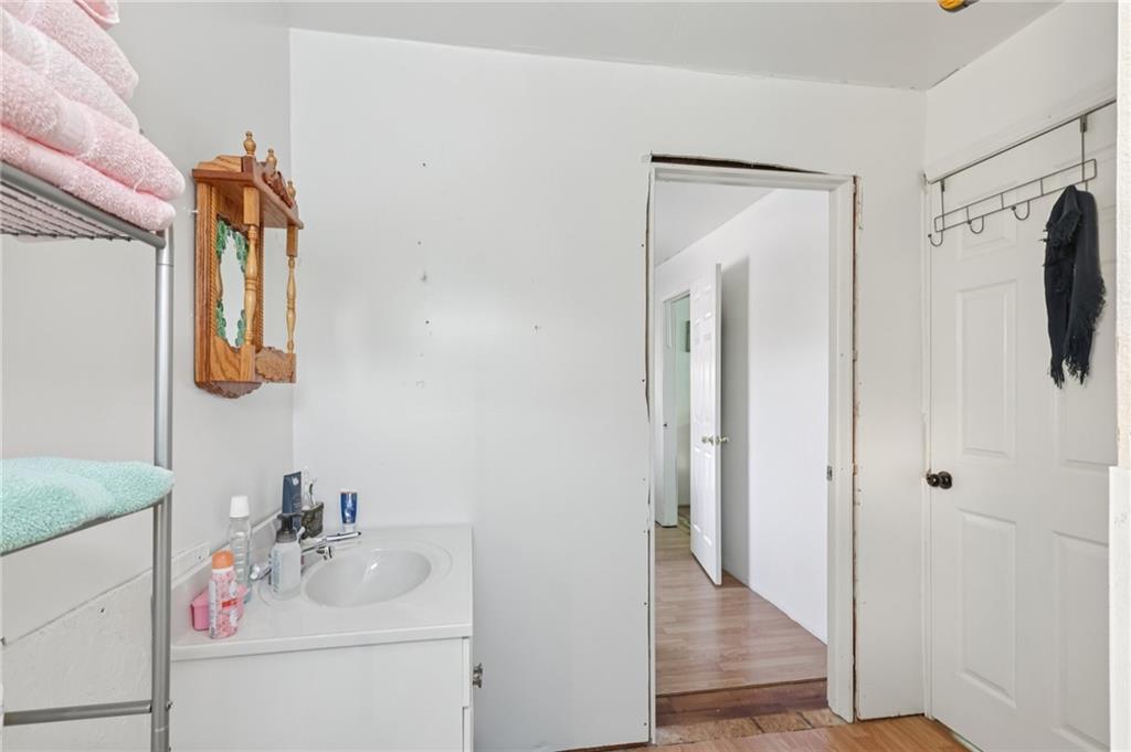 2753 Hemlock Lake Road Rossiter, PA 15772 - Photo 25 of 50 a bathroom with a sink vanity and mirror