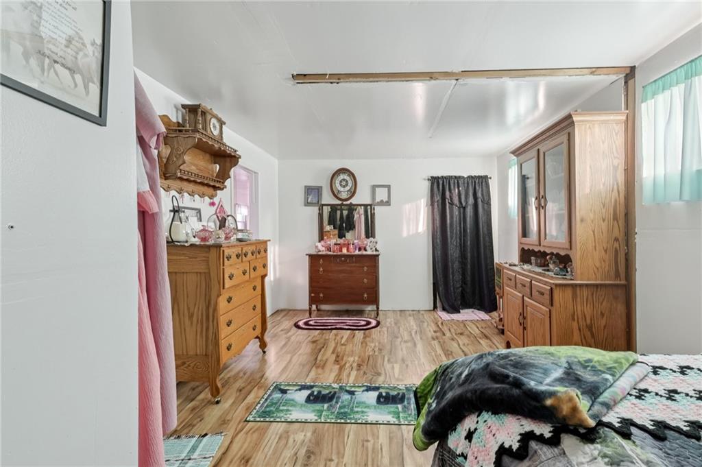 2753 Hemlock Lake Road Rossiter, PA 15772 - Photo 27 of 50 a bedroom with a bed and a flat screen tv