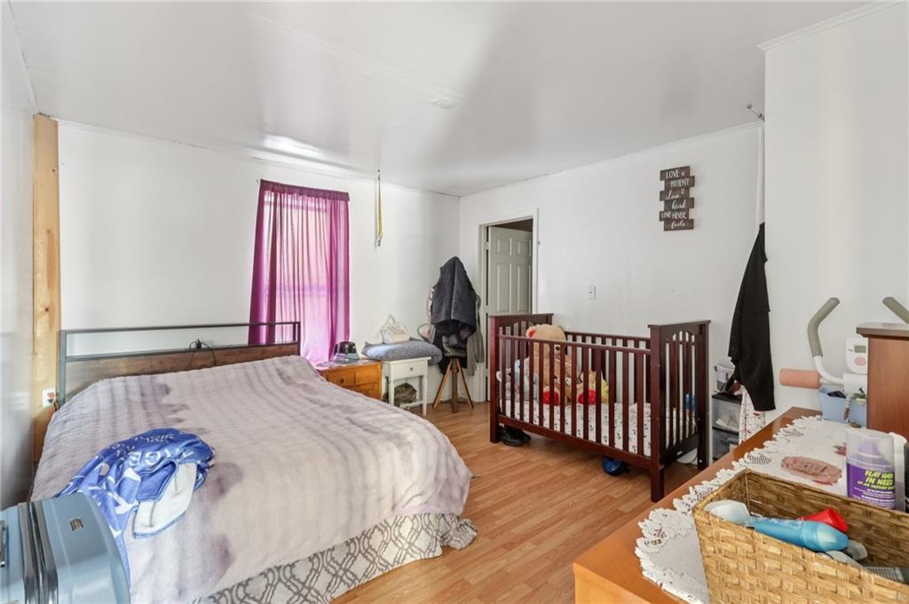 2753 Hemlock Lake Road Rossiter, PA 15772 - Photo 34 of 50 a bedroom with a bed and a window