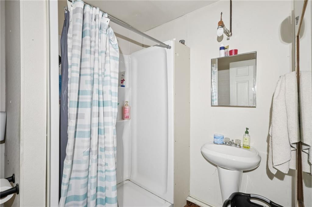 2753 Hemlock Lake Road Rossiter, PA 15772 - Photo 36 of 50 a bathroom with a sink and a mirror