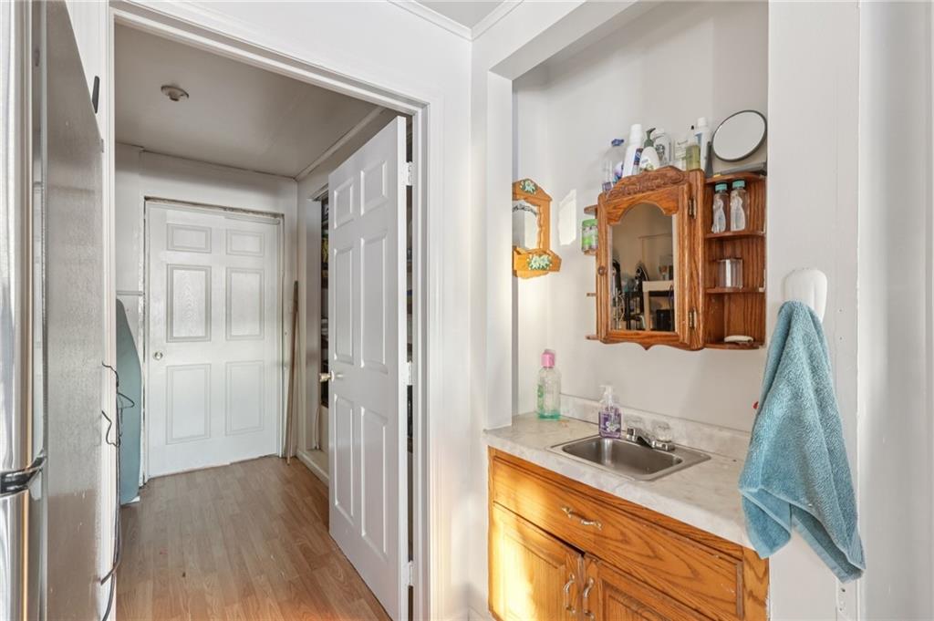 2753 Hemlock Lake Road Rossiter, PA 15772 - Photo 44 of 50 a bathroom with a granite countertop sink and a mirror