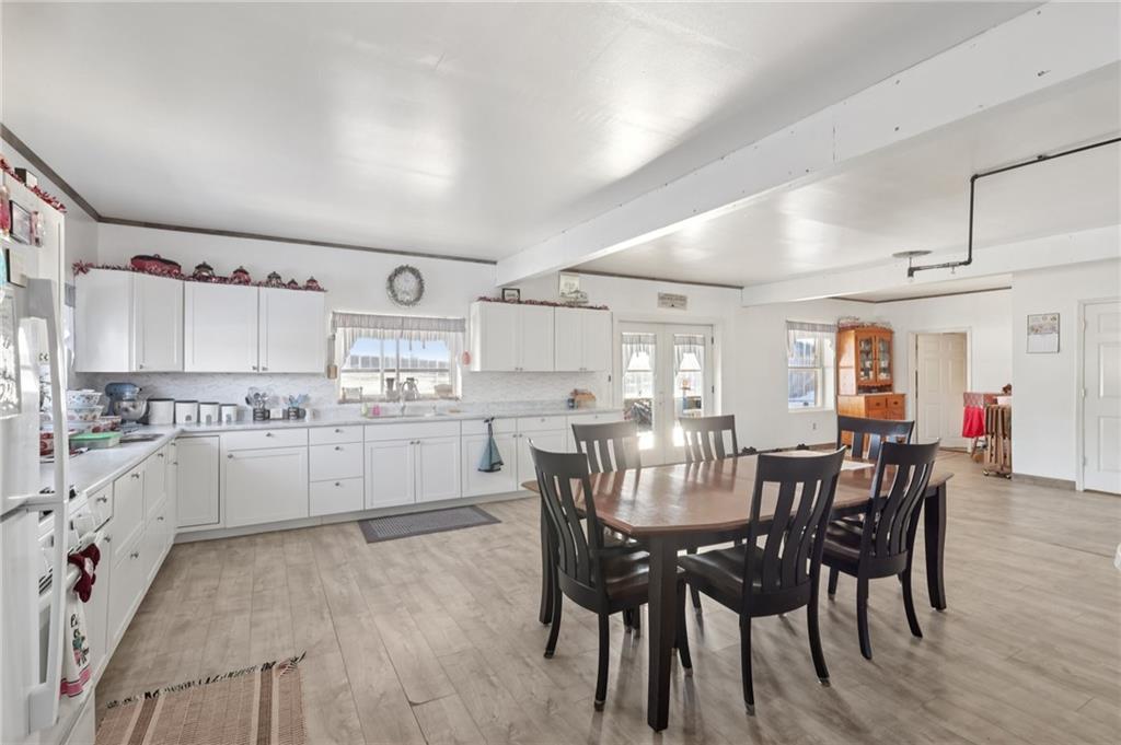 2753 Hemlock Lake Road Rossiter, PA 15772 - Photo 6 of 50 a view of a dining room with furniture and wooden floor